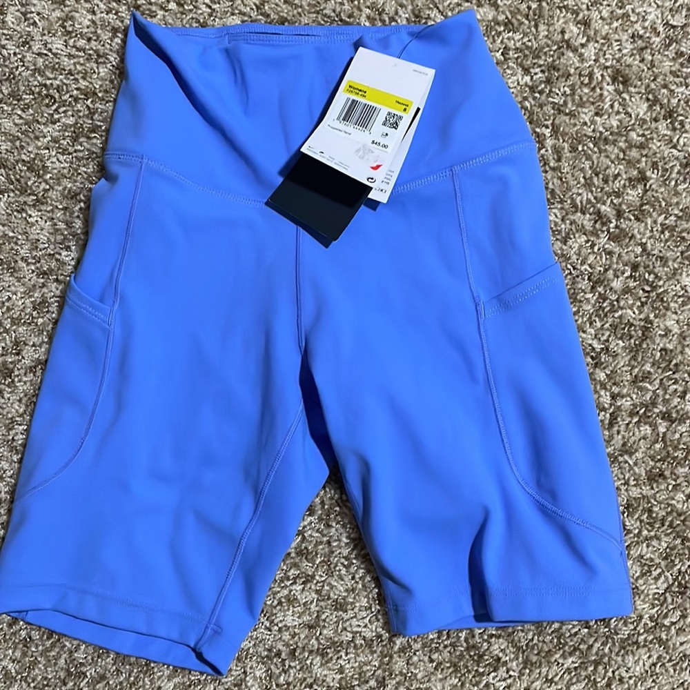 Nike Women's Light Blue Biker 8” High Waist Shorts